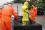 Civil protection officers decontaminate the boots of a MEST member in a mobile decontamination facility.