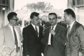 L.t.r.: Witold Lisowski (IAEA Executive Secretary of the conference), Evgueni Piskarev (Scientific Secretary, Institute of Atomic Energy, Russia), Bronislaw Buras (IAEA Coordinating Scientific Secretary) and Claude Etievant (Scientific Secretary, CEA, France) during an informal conversation, seen in front of a window with view to Festung Hohensalzburg at the Europahaus in Salzburg, Austria, September 1961. 
(IAEA Archives/Credit: Photo Ellinger)