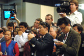 Members of the press and IAEA staff at the press conference following the announcement that the Agency and its Director General won the Nobel Peace Prize. (Vienna International Centre, Vienna Austria, 7 October 2005)