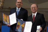 10 December 2005 | Holding the Nobel Medals for Peace.  The 2005 prize is jointly shared by the IAEA and its Director General Mohamed ElBaradei.