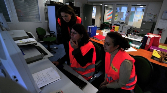 Members of the Response Communications Team at work in the IEC Communications Room during the Full Response Mode Exercise (FRME), IAEA, Vienna, Austria, 21 November 2012