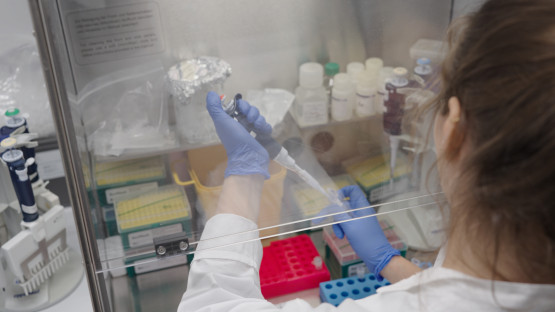 A lab technician preparing samples 