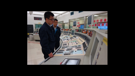 Managing knowledge and experience is key to safe and sustainable operations. Here, two engineers at a control room at China's Qinshan NPP. (Photo: CNNC)